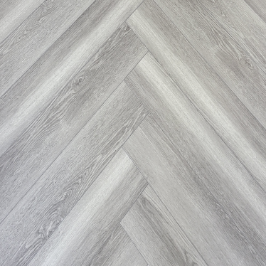 Cool grey herringbone 6.5mm SPC LVT Heavy duty 0.5 wear layer Click flooring. **Built in underlay**  DFH510