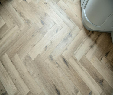 Evolve classic oak herringbone 5mm SPC LVT Click flooring. **Built in underlay**